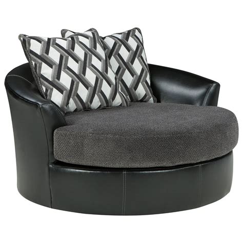 black oversized swivel accent chair.